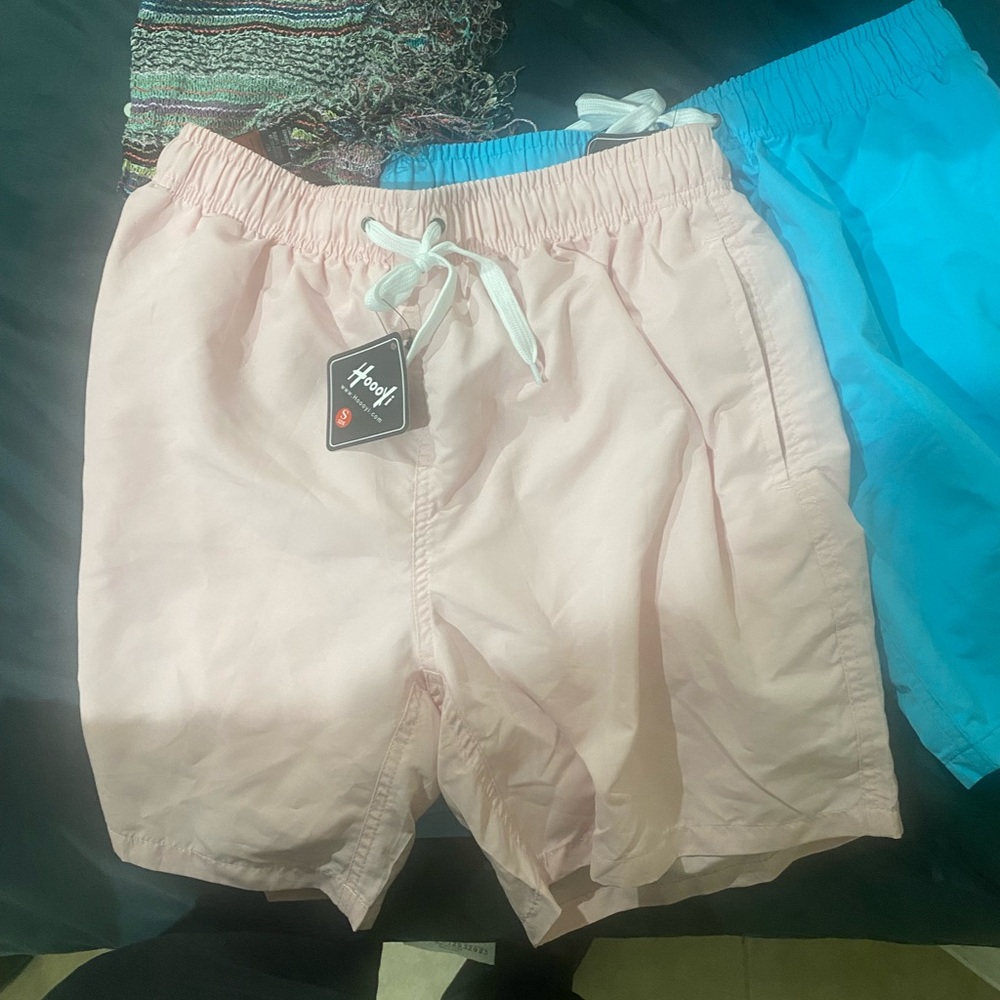 YOU GET 2 THEM FOR THIS PRICE !Men's bathing suit get 2 new with tags